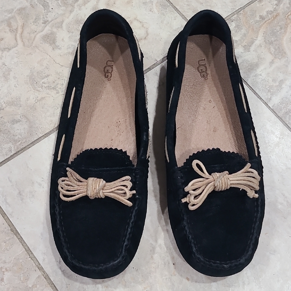 UGG Women's Black Moccasins with Tan Bow